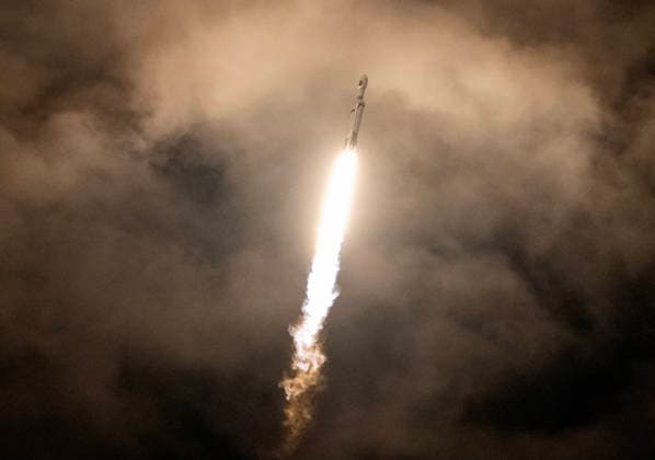 SpaceX Falcon Heavy strakes through the clouds as it launches with classified NROL-97 national security payload for the National Reconnaissance Office (NTO) from LC-39A at Kennedy Space Center, Florida on October 1, 2026. NRO is America s spy satellite agency.  KSC2026100204 PATxBENIC