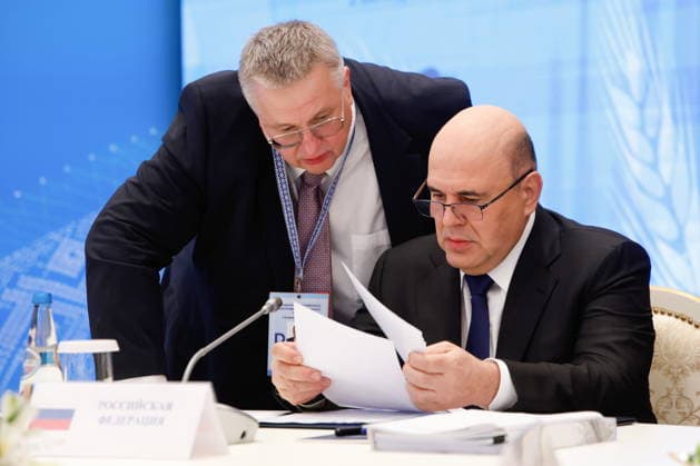 BELARUS, MINSK - OCTOBER 2, 2026: Mikhail Mishustin, Russia s Prime Minister, listens to his deputy Alexei Overchuk during a restricted meeting of the Eurasian Intergovernmental Council Minsk Belarus  - ZUMAt113 20261002_zaa_t113_040 Copyright: xDmitryxAstakhovx