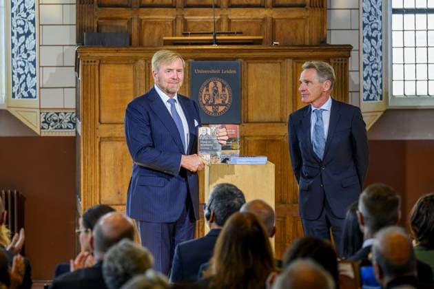 Leiden, The Netherlands, 2026-10-02 11:59:36 LEIDEN, 02-10-2026, Leiden University. King Willem Alexander receives the results of the independent research into the role of the House of Orange-Nassau in the colonial history of the Netherlands in the Academy Building of Leiden University. Principal investigator Prof. Dr. Gert Oostindie presents the King with the five books on which approximately sixty researchers have worked over the past few years, including the comprehensive popular book *Oranje en de KoloniÃ«n, 1600-2025. De kolonie geschiedenis van het Huis Oranje-Nassau*. PHOTO: NLBeeld Patrick van Emst Credit: NL Beeld Patrick van Emst  Copyright: xx x