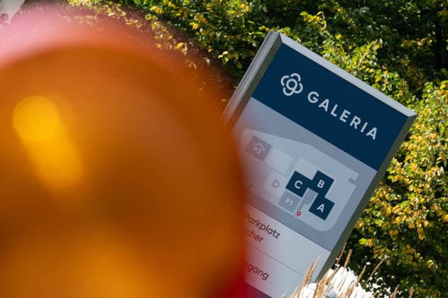 The GALERIA department store chain has filed for bankruptcy for the fourth time; feature, background image, stock photo, construction site barriers, warning lights, at the former Galeria corporate headquarters in Essen, October 2, 2026