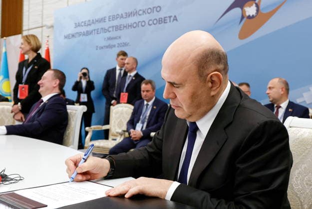BELARUS, MINSK - OCTOBER 2, 2026: Mikhail Mishustin, Russia s Prime Minister, signs final documents during an expanded meeting of the Eurasian Intergovernmental Council Minsk Belarus  - ZUMAt113 20261002_zaa_t113_270 Copyright: xDmitryxAstakhovx