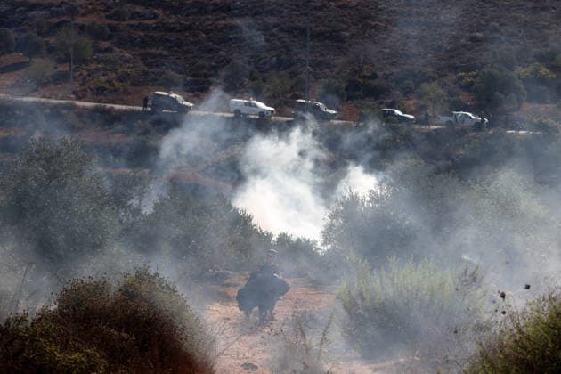 Israeli settlers intervene against Palestinians olive-picking event in Nablus town NABLUS, WEST BANK, PALESTINE - OCTOBER 02: Israeli settlers, under the protection of Israeli forces, intervene against an olive-picking event organized by Palestinians and a group of activists in the town of Beita, in Nablus, West Bank, Palestine on October 02, 2026. Issam Rimawi Anadolu Nablus West Bank. Editorial use only. Please get in touch for any other usage. Copyright: x2026xAnadoluxIssamxRimawix