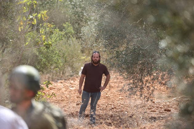 Israeli settlers intervene against Palestinians olive-picking event in Nablus town NABLUS, WEST BANK, PALESTINE - OCTOBER 02: Israeli settlers, under the protection of Israeli forces, intervene against an olive-picking event organized by Palestinians and a group of activists in the town of Beita, in Nablus, West Bank, Palestine on October 02, 2026. Issam Rimawi Anadolu Nablus West Bank. Editorial use only. Please get in touch for any other usage. Copyright: x2026xAnadoluxIssamxRimawix