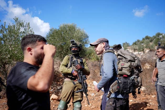 Israeli settlers intervene against Palestinians olive-picking event in Nablus town NABLUS, WEST BANK, PALESTINE - OCTOBER 02: Israeli settlers, under the protection of Israeli forces, intervene against an olive-picking event organized by Palestinians and a group of activists in the town of Beita, in Nablus, West Bank, Palestine on October 02, 2026. Issam Rimawi Anadolu Nablus West Bank. Editorial use only. Please get in touch for any other usage.  Copyright: x2026xAnadoluxIssamxRimawix