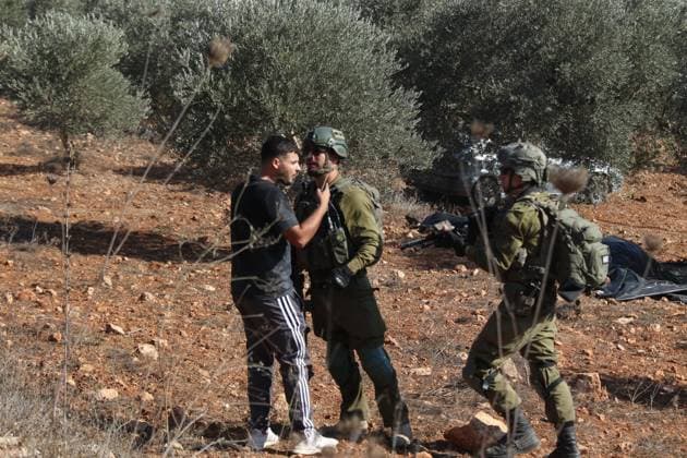 Israeli Settlers And Forces Attacked Palestinian Farmers During Olive Harvest In Beita BEITA, NABLUS, PALESTINE OCTOBER 2, 2026: Israeli settlers and Israeli forces attacked Palestinian farmers while they were picking olives in the Jabal Al-Arma area, east of Beita, south of Nablus. Settlers fired live ammunition toward the farmers, with no injuries reported. According to the Palestinian Red Crescent Society, Israeli forces also beat a 46-year-old Palestinian farmer during raids on olive farms in Beita. Witnesses told Anadolu that Israeli forces fired stun grenades and tear gas at farmers in the Jabal Al-Arma area, forcing them to leave. The olive harvest begins in early October and continues through the end of November, making it an im Copyright: x xSalmanxMohsenxAlkhatibx xJNAxPressx