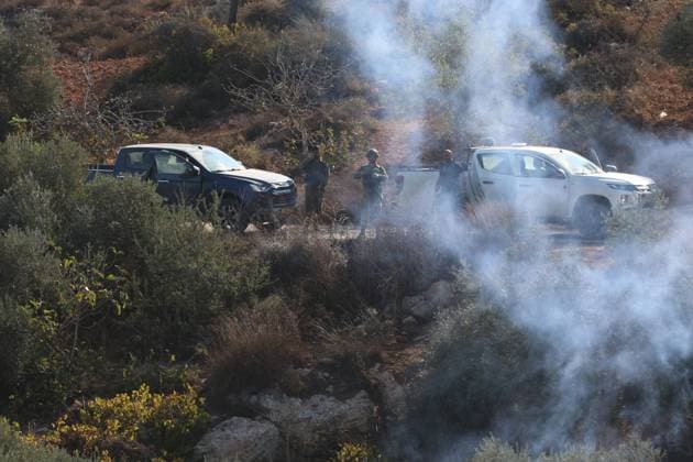 Israeli Settlers And Forces Attacked Palestinian Farmers During Olive Harvest In Beita BEITA, NABLUS, PALESTINE OCTOBER 2, 2026: Israeli settlers and Israeli forces attacked Palestinian farmers while they were picking olives in the Jabal Al-Arma area, east of Beita, south of Nablus. Settlers fired live ammunition toward the farmers, with no injuries reported. According to the Palestinian Red Crescent Society, Israeli forces also beat a 46-year-old Palestinian farmer during raids on olive farms in Beita. Witnesses told Anadolu that Israeli forces fired stun grenades and tear gas at farmers in the Jabal Al-Arma area, forcing them to leave. The olive harvest begins in early October and continues through the end of November, making it an im Copyright: x xSalmanxMohsenxAlkhatibx xJNAxPressx