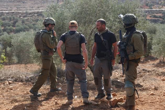 Israeli Settlers And Forces Attacked Palestinian Farmers During Olive Harvest In Beita BEITA, NABLUS, PALESTINE OCTOBER 2, 2026: Israeli settlers and Israeli forces attacked Palestinian farmers while they were picking olives in the Jabal Al-Arma area, east of Beita, south of Nablus. Settlers fired live ammunition toward the farmers, with no injuries reported. According to the Palestinian Red Crescent Society, Israeli forces also beat a 46-year-old Palestinian farmer during raids on olive farms in Beita. Witnesses told Anadolu that Israeli forces fired stun grenades and tear gas at farmers in the Jabal Al-Arma area, forcing them to leave. The olive harvest begins in early October and continues through the end of November, making it an im Copyright: x xSalmanxMohsenxAlkhatibx xJNAxPressx