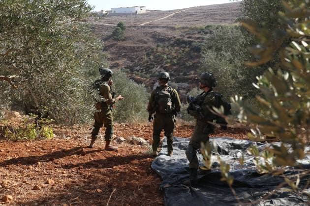 October 2, 2026, Nablus, Palestine, State of: BEITA, NABLUS, PALESTINE Ã¢â‚¬ OCTOBER 2, 2026: Israeli settlers and Israeli forces attacked Palestinian farmers while they were picking olives in the Jabal Al-Arma area, east of Beita, south of Nablus. Settlers fired live ammunition toward the farmers, with no injuries reported. According to the Palestinian Red Crescent Society, Israeli forces also beat a 46-year-old Palestinian farmer during raids on olive farms in Beita. Witnesses told Anadolu that Israeli forces fired stun grenades and tear gas at farmers in the Jabal Al-Arma area, forcing them to leave. The olive harvest begins in early October and continues through the end of November, making it an important agricultural and economic se - ZUMAq101 20261002_zna_q101_063 Copyright: xSalmanxMohsenxAlkhatibx