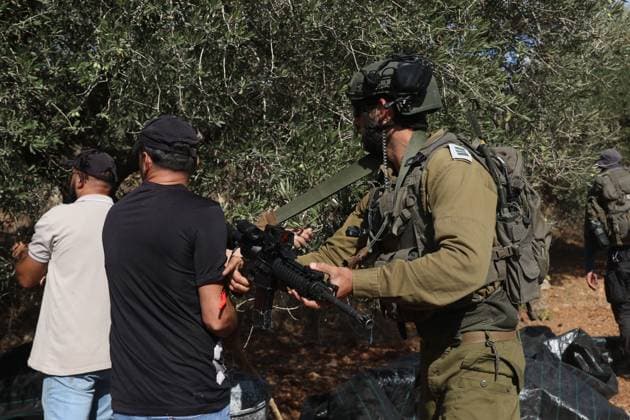 October 2, 2026, Nablus, Palestine, State of: BEITA, NABLUS, PALESTINE Ã¢â‚¬ OCTOBER 2, 2026: Israeli settlers and Israeli forces attacked Palestinian farmers while they were picking olives in the Jabal Al-Arma area, east of Beita, south of Nablus. Settlers fired live ammunition toward the farmers, with no injuries reported. According to the Palestinian Red Crescent Society, Israeli forces also beat a 46-year-old Palestinian farmer during raids on olive farms in Beita. Witnesses told Anadolu that Israeli forces fired stun grenades and tear gas at farmers in the Jabal Al-Arma area, forcing them to leave. The olive harvest begins in early October and continues through the end of November, making it an important agricultural and economic se - ZUMAq101 20261002_zna_q101_058 Copyright: xSalmanxMohsenxAlkhatibx