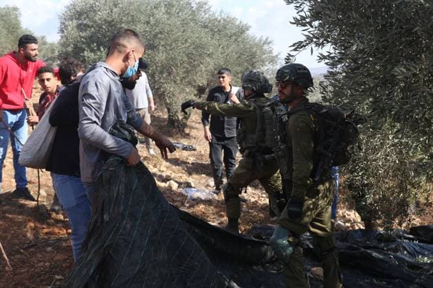October 2, 2026, Nablus, Palestine, State of: BEITA, NABLUS, PALESTINE Ã¢â‚¬ OCTOBER 2, 2026: Israeli settlers and Israeli forces attacked Palestinian farmers while they were picking olives in the Jabal Al-Arma area, east of Beita, south of Nablus. Settlers fired live ammunition toward the farmers, with no injuries reported. According to the Palestinian Red Crescent Society, Israeli forces also beat a 46-year-old Palestinian farmer during raids on olive farms in Beita. Witnesses told Anadolu that Israeli forces fired stun grenades and tear gas at farmers in the Jabal Al-Arma area, forcing them to leave. The olive harvest begins in early October and continues through the end of November, making it an important agricultural and economic se - ZUMAq101 20261002_zna_q101_060 Copyright: xSalmanxMohsenxAlkhatibx