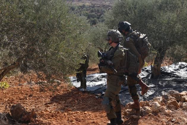 October 2, 2026, Nablus, Palestine, State of: BEITA, NABLUS, PALESTINE Ã¢â‚¬ OCTOBER 2, 2026: Israeli settlers and Israeli forces attacked Palestinian farmers while they were picking olives in the Jabal Al-Arma area, east of Beita, south of Nablus. Settlers fired live ammunition toward the farmers, with no injuries reported. According to the Palestinian Red Crescent Society, Israeli forces also beat a 46-year-old Palestinian farmer during raids on olive farms in Beita. Witnesses told Anadolu that Israeli forces fired stun grenades and tear gas at farmers in the Jabal Al-Arma area, forcing them to leave. The olive harvest begins in early October and continues through the end of November, making it an important agricultural and economic se - ZUMAq101 20261002_zna_q101_062 Copyright: xSalmanxMohsenxAlkhatibx