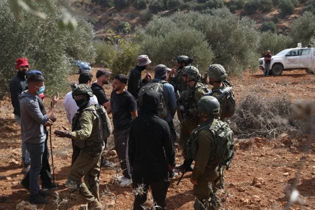 October 2, 2026, Nablus, Palestine, State of: BEITA, NABLUS, PALESTINE Ã¢â‚¬ OCTOBER 2, 2026: Israeli settlers and Israeli forces attacked Palestinian farmers while they were picking olives in the Jabal Al-Arma area, east of Beita, south of Nablus. Settlers fired live ammunition toward the farmers, with no injuries reported. According to the Palestinian Red Crescent Society, Israeli forces also beat a 46-year-old Palestinian farmer during raids on olive farms in Beita. Witnesses told Anadolu that Israeli forces fired stun grenades and tear gas at farmers in the Jabal Al-Arma area, forcing them to leave. The olive harvest begins in early October and continues through the end of November, making it an important agricultural and economic se - ZUMAq101 20261002_zna_q101_096 Copyright: xSalmanxMohsenxAlkhatibx
