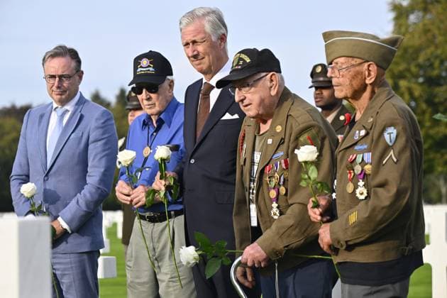Prime Minister Bart De Wever and King Philippe - Filip of Belgium are pictured with war veterans during a royal visit to the World War II Commemoration at the American Military Cemetery in Henri-Chapelle, Plombieres, on Friday 2 October 2026. The ceremony pays tribute to the American veterans in attendance and to their fallen comrades-in-arms. It features testimonials, musical performances, and prayers, as well as a wreath-laying ceremony, a salute, and a flyover by U.S. aircraft.  ERICxLALMAND 188545471