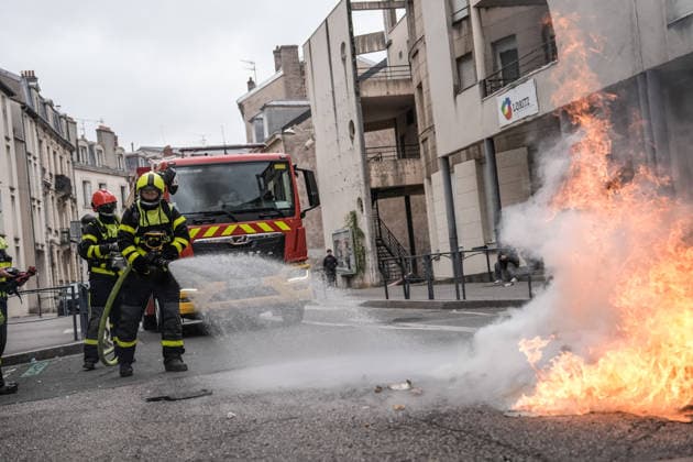 Students clash with police during high-school mobilization in Nancy NANCY, FRANCE - OCTOBER 2: Firefighters work to extinguish flames rising from burning barricades erected by high school students during nationwide education protests Nancy, France on October 2, 2026. Students gather around several schools and clash with police forces as a nationwide high-school mobilization continues over school conditions and demands for greater education resources in Nancy. Police deploy security units around several locations as demonstrations and blockades continue. Muhammed Said Tako Anadolu Nancy France. Editorial use only. Please get in touch for any other usage.  Copyright: x2026xAnadoluxMuhammedxSaidxTakox