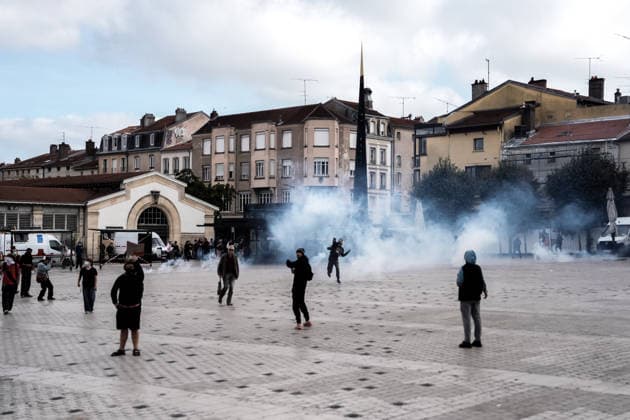 Students clash with police during high-school mobilization in Nancy NANCY, FRANCE - OCTOBER 2: Students clash with security forces as nationwide high-school mobilization continues over school conditions and demands for greater education resources in Nancy, France on October 2, 2026. Law enforcement officers used tear gas to disperse student crowds protesting across multiple school locations as part of nationwide mobilizations over education resources and school conditions. Police deploy security units around several locations as demonstrations and blockades continue. Muhammed Said Tako Anadolu Nancy France. Editorial use only. Please get in touch for any other usage.  Copyright: x2026xAnadoluxMuhammedxSaidxTakox