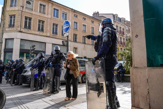 Students clash with police during high-school mobilization in Nancy NANCY, FRANCE - OCTOBER 2: Students clash with security forces as nationwide high-school mobilization continues over school conditions and demands for greater education resources in Nancy, France on October 2, 2026. Law enforcement officers used tear gas to disperse student crowds protesting across multiple school locations as part of nationwide mobilizations over education resources and school conditions. Police deploy security units around several locations as demonstrations and blockades continue. Muhammed Said Tako Anadolu Nancy France. Editorial use only. Please get in touch for any other usage.  Copyright: x2026xAnadoluxMuhammedxSaidxTakox