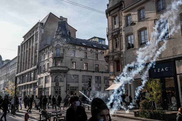 Students clash with police during high-school mobilization in Nancy NANCY, FRANCE - OCTOBER 2: Students clash with security forces as nationwide high-school mobilization continues over school conditions and demands for greater education resources in Nancy, France on October 2, 2026. Law enforcement officers used tear gas to disperse student crowds protesting across multiple school locations as part of nationwide mobilizations over education resources and school conditions. Police deploy security units around several locations as demonstrations and blockades continue. Muhammed Said Tako Anadolu Nancy France. Editorial use only. Please get in touch for any other usage.  Copyright: x2026xAnadoluxMuhammedxSaidxTakox