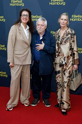 Malika Rabahallah, Wolf Biermann, and Pamela Biermann at the premiere of the documentary *Biermann* at the 34th Hamburg Film Festival in 2026 at Cinemaxx Dammtor in Hamburg, October 2, 2026 Foto:xC.xTamckex xFuturexImagex biermann_6010