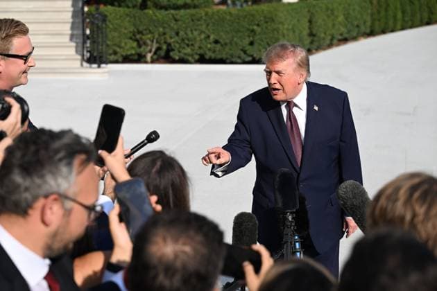 October 2, 2026, Washington, Dc, USA: U.S. President Donald Trump talks to the media before boarding Marine One on the South Lawn of the White House in Washington, DC, United States, on October 2, 2026. Washington USA  - ZUMAs197 20261002_aaa_s197_260 Copyright: xKylexMazzax