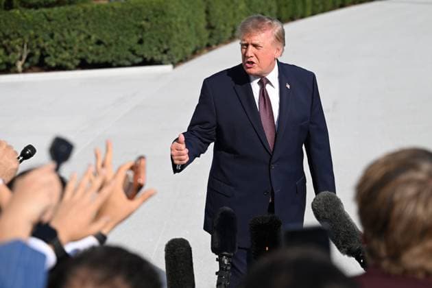 October 2, 2026, Washington, Dc, USA: U.S. President Donald Trump talks to the media before boarding Marine One on the South Lawn of the White House in Washington, DC, United States, on October 2, 2026. Washington USA - ZUMAs197 20261002_aaa_s197_264 Copyright: xKylexMazzax