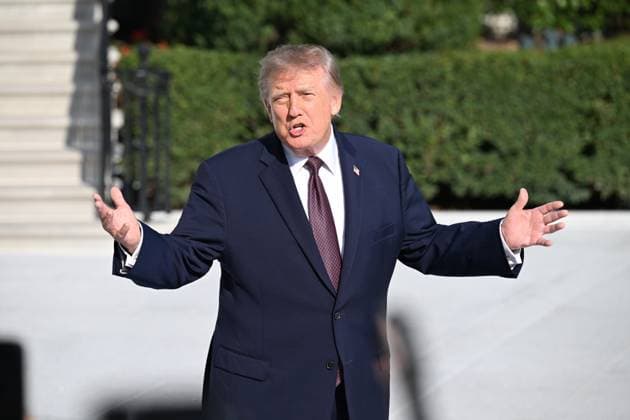 October 2, 2026, Washington, Dc, USA: U.S. President Donald Trump talks to the media before boarding Marine One on the South Lawn of the White House in Washington, DC, United States, on October 2, 2026. Washington USA - ZUMAs197 20261002_aaa_s197_280 Copyright: xKylexMazzax