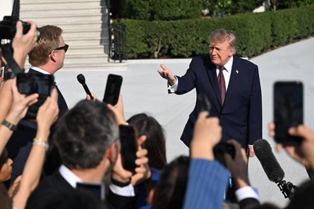 October 2, 2026, Washington, Dc, USA: U.S. President Donald Trump talks to the media before boarding Marine One on the South Lawn of the White House in Washington, DC, United States, on October 2, 2026. Washington USA - ZUMAs197 20261002_aaa_s197_281 Copyright: xKylexMazzax
