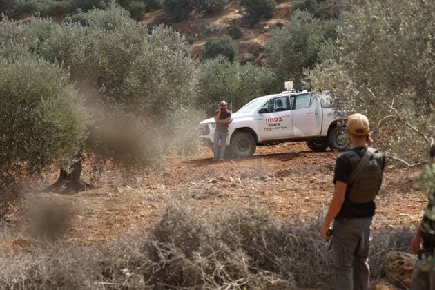 October 2, 2026, Nablus, Palestine, State of: BEITA, NABLUS, PALESTINE Ã¢â‚¬ OCTOBER 2, 2026: Israeli settlers and Israeli forces attacked Palestinian farmers while they were picking olives in the Jabal Al-Arma area, east of Beita, south of Nablus. Settlers fired live ammunition toward the farmers, with no injuries reported. According to the Palestinian Red Crescent Society, Israeli forces also beat a 46-year-old Palestinian farmer during raids on olive farms in Beita. Witnesses told Anadolu that Israeli forces fired stun grenades and tear gas at farmers in the Jabal Al-Arma area, forcing them to leave. The olive harvest begins in early October and continues through the end of November, making it an important agricultural and economic se - ZUMAq101 20261002_zna_q101_092 Copyright: xSalmanxMohsenxAlkhatibx