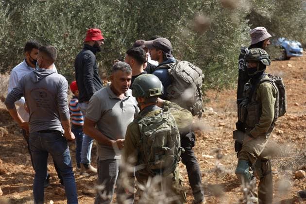 October 2, 2026, Nablus, Palestine, State of: BEITA, NABLUS, PALESTINE Ã¢â‚¬ OCTOBER 2, 2026: Israeli settlers and Israeli forces attacked Palestinian farmers while they were picking olives in the Jabal Al-Arma area, east of Beita, south of Nablus. Settlers fired live ammunition toward the farmers, with no injuries reported. According to the Palestinian Red Crescent Society, Israeli forces also beat a 46-year-old Palestinian farmer during raids on olive farms in Beita. Witnesses told Anadolu that Israeli forces fired stun grenades and tear gas at farmers in the Jabal Al-Arma area, forcing them to leave. The olive harvest begins in early October and continues through the end of November, making it an important agricultural and economic se - ZUMAq101 20261002_zna_q101_094 Copyright: xSalmanxMohsenxAlkhatibx