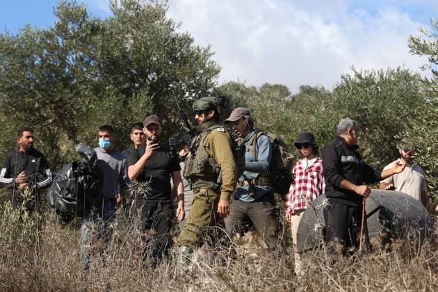 October 2, 2026, Nablus, Palestine, State of: BEITA, NABLUS, PALESTINE †OCTOBER 2, 2026: Israeli settlers and Israeli forces attacked Palestinian farmers while they were picking olives in the Jabal Al-Arma area, east of Beita, south of Nablus. Settlers fired live ammunition toward the farmers, with no injuries reported. According to the Palestinian Red Crescent Society, Israeli forces also beat a 46-year-old Palestinian farmer during raids on olive farms in Beita. Witnesses told Anadolu that Israeli forces fired stun grenades and tear gas at farmers in the Jabal Al-Arma area, forcing them to leave. The olive harvest begins in early October and continues through the end of November, making it an important agricultural and economic se - ZUMAq101 20261002_zna_q101_082 Copyright: xSalmanxMohsenxAlkhatibx