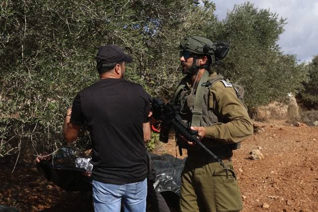 October 2, 2026, Nablus, Palestine, State of: BEITA, NABLUS, PALESTINE †OCTOBER 2, 2026: Israeli settlers and Israeli forces attacked Palestinian farmers while they were picking olives in the Jabal Al-Arma area, east of Beita, south of Nablus. Settlers fired live ammunition toward the farmers, with no injuries reported. According to the Palestinian Red Crescent Society, Israeli forces also beat a 46-year-old Palestinian farmer during raids on olive farms in Beita. Witnesses told Anadolu that Israeli forces fired stun grenades and tear gas at farmers in the Jabal Al-Arma area, forcing them to leave. The olive harvest begins in early October and continues through the end of November, making it an important agricultural and economic se - ZUMAq101 20261002_zna_q101_072 Copyright: xSalmanxMohsenxAlkhatibx