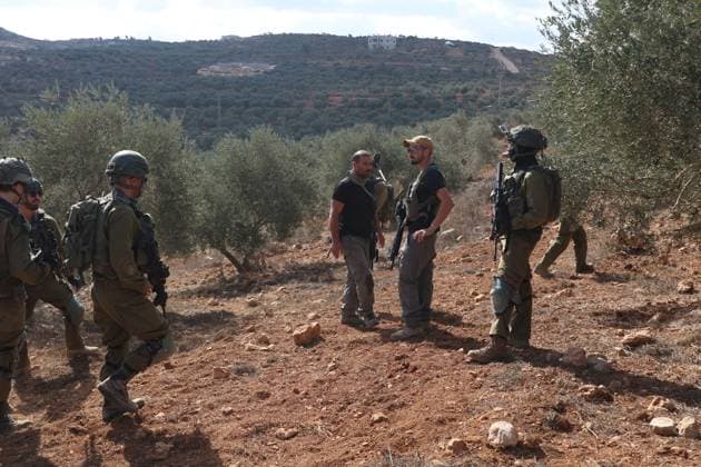 October 2, 2026, Nablus, Palestine, State of: BEITA, NABLUS, PALESTINE †OCTOBER 2, 2026: Israeli settlers and Israeli forces attacked Palestinian farmers while they were picking olives in the Jabal Al-Arma area, east of Beita, south of Nablus. Settlers fired live ammunition toward the farmers, with no injuries reported. According to the Palestinian Red Crescent Society, Israeli forces also beat a 46-year-old Palestinian farmer during raids on olive farms in Beita. Witnesses told Anadolu that Israeli forces fired stun grenades and tear gas at farmers in the Jabal Al-Arma area, forcing them to leave. The olive harvest begins in early October and continues through the end of November, making it an important agricultural and economic se - ZUMAq101 20261002_zna_q101_073 Copyright: xSalmanxMohsenxAlkhatibx