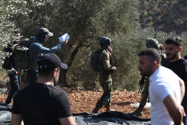 October 2, 2026, Nablus, Palestine, State of: BEITA, NABLUS, PALESTINE †OCTOBER 2, 2026: Israeli settlers and Israeli forces attacked Palestinian farmers while they were picking olives in the Jabal Al-Arma area, east of Beita, south of Nablus. Settlers fired live ammunition toward the farmers, with no injuries reported. According to the Palestinian Red Crescent Society, Israeli forces also beat a 46-year-old Palestinian farmer during raids on olive farms in Beita. Witnesses told Anadolu that Israeli forces fired stun grenades and tear gas at farmers in the Jabal Al-Arma area, forcing them to leave. The olive harvest begins in early October and continues through the end of November, making it an important agricultural and economic se - ZUMAq101 20261002_zna_q101_078 Copyright: xSalmanxMohsenxAlkhatibx