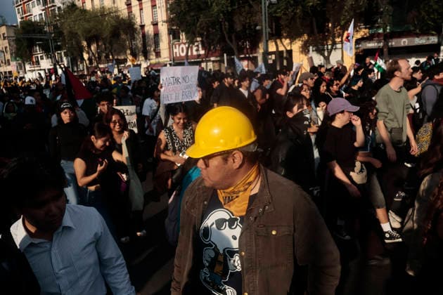 October 2, 2026, Mexico City, Cdmx, Mexico: Thousands of people carrying placards gathered at the Plaza de las Tres Culturas and the surrounding area to commemorate the 58th anniversary of the 1968 student massacre in Tlatelolco; they marched toward Mexico City s Zo³calo to hold a rally in memory of those who died during the 1968 student movement. Prior to this, hundreds of students arrived at the meeting point near the Tlatelolco Metro station, where a heavy police deployment from the Secretariat of Citizen Security (SSCCDMX) was already waiting for them; these hooded officers on motorcycles boxed the students in, both inside and outside the metro facilities, to prevent their peaceful movement, sparking conflict through abuses of authori - ZUMAp204 20261002_zip_p204_126 Copyright: xJosuexPerezx