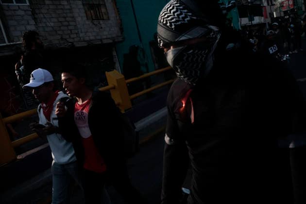 October 2, 2026, Mexico City, Cdmx, Mexico: Thousands of people carrying placards gathered at the Plaza de las Tres Culturas and the surrounding area to commemorate the 58th anniversary of the 1968 student massacre in Tlatelolco; they marched toward Mexico City s Zo³calo to hold a rally in memory of those who died during the 1968 student movement. Prior to this, hundreds of students arrived at the meeting point near the Tlatelolco Metro station, where a heavy police deployment from the Secretariat of Citizen Security (SSCCDMX) was already waiting for them; these hooded officers on motorcycles boxed the students in, both inside and outside the metro facilities, to prevent their peaceful movement, sparking conflict through abuses of authori - ZUMAp204 20261002_zip_p204_127 Copyright: xJosuexPerezx