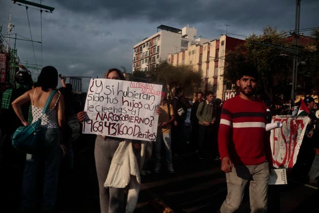 October 2, 2026, Mexico City, Cdmx, Mexico: Thousands of people carrying placards gathered at the Plaza de las Tres Culturas and the surrounding area to commemorate the 58th anniversary of the 1968 student massacre in Tlatelolco; they marched toward Mexico City s Zo³calo to hold a rally in memory of those who died during the 1968 student movement. Prior to this, hundreds of students arrived at the meeting point near the Tlatelolco Metro station, where a heavy police deployment from the Secretariat of Citizen Security (SSCCDMX) was already waiting for them; these hooded officers on motorcycles boxed the students in, both inside and outside the metro facilities, to prevent their peaceful movement, sparking conflict through abuses of authori - ZUMAp204 20261002_zip_p204_120 Copyright: xJosuexPerezx