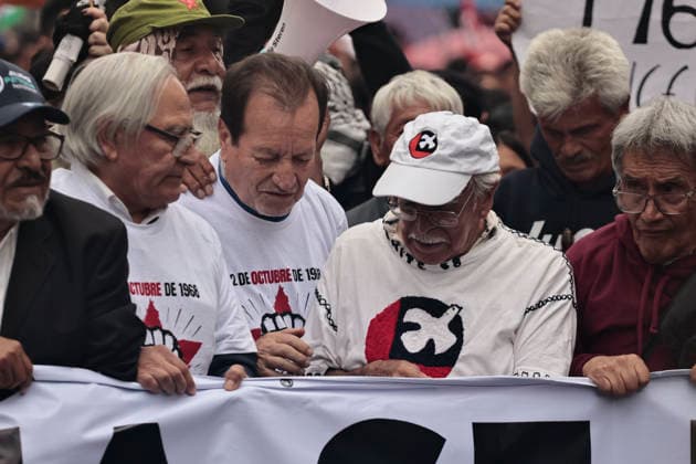 October 2, 2026, Mexico City, Cdmx, Mexico: Thousands of people carrying placards gathered at the Plaza de las Tres Culturas and the surrounding area to commemorate the 58th anniversary of the 1968 student massacre in Tlatelolco; they marched toward Mexico City s ZoÂ³calo to hold a rally in memory of those who died during the 1968 student movement. Prior to this, hundreds of students arrived at the meeting point near the Tlatelolco Metro station, where a heavy police deployment from the Secretariat of Citizen Security (SSCCDMX) was already waiting for them; these hooded officers on motorcycles boxed the students in, both inside and outside the metro facilities, to prevent their peaceful movement, sparking conflict through abuses of authori - ZUMAp204 20261002_zip_p204_078 Copyright: xJosuexPerezx