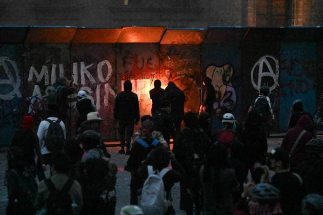 October 2, 2026: TO-45324-MEXICO , October 2, 2026. Student leaders from 1968 marched alongside students from various public universities, feminist collectives, "searching mothers," and Indigenous people from diverse regions to commemorate the anniversary of the Tlatelolco Massacre. They chanted slogans such as "No forgiveness, no forgetting," "Death to the State," and "It was the military." They marched along various avenues in the Mexican capital, concluding their rally at the Z& xf3;calo plaza, where clashes broke out with police stationed behind the barriers guarding the National Palace. In Mexico City. Clasos.com.mx - ZUMAcs4_ 20261002_faa_cs4_218 Copyright: xJavierxLiraxOterox