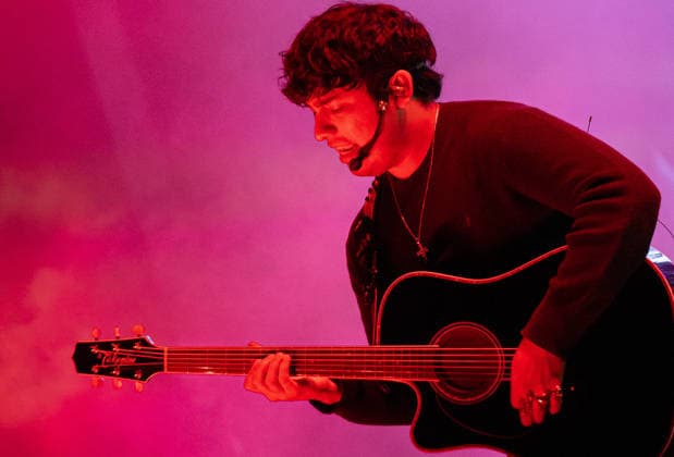 October 2, 2026, San Luis Potosi, San Luis Potosi, Mexico: Guitarist BRIAN TOVAR of the regional Mexican music group ESLABON ARMADO is seen in a medium close-up shot playing a Takamine acoustic guitar under magenta stage lights at Teatro de la Ciudad in Parque Tangamanga 1 in San Luis Potosi, Mexico. San Luis Potosi Mexico - ZUMAm311 20261002_zip_m311_004 Copyright: xAlbertoxMartinezx