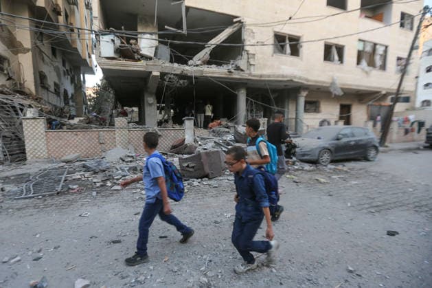 October 3, 2026, Gaza City, Gaza Strip, Palestinian Territory: Palestinians inspect the destruction after Israeli aircraft targeted a residential apartment in the Al-Rimal neighborhood of western Gaza City early in the morning. According to local sources, five Palestinians were killed, including four women. Among those killed were a Christian mother and her daughter. Gaza City Palestinian Territory - ZUMAz119 20261003_zip_z119_003 Copyright: xSalahxHashemx