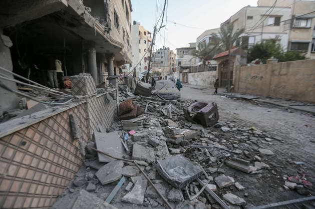 October 3, 2026, Gaza City, Gaza Strip, Palestinian Territory: Palestinians inspect the destruction after Israeli aircraft targeted a residential apartment in the Al-Rimal neighborhood of western Gaza City early in the morning. According to local sources, five Palestinians were killed, including four women. Among those killed were a Christian mother and her daughter. Gaza City Palestinian Territory - ZUMAz119 20261003_zip_z119_002 Copyright: xSalahxHashemx