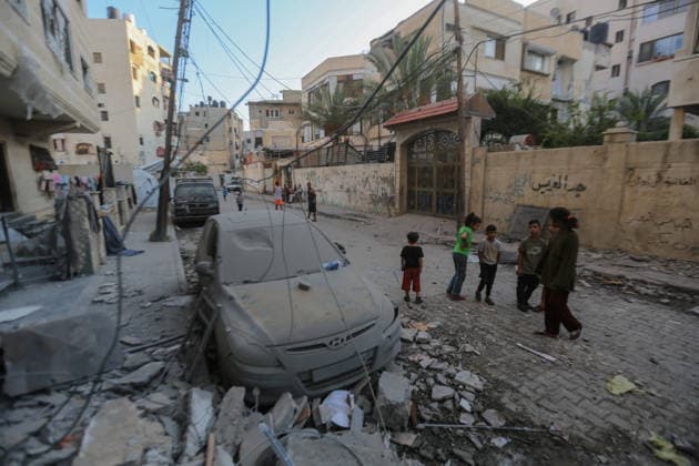 October 3, 2026, Gaza City, Gaza Strip, Palestinian Territory: Palestinians inspect the destruction after Israeli aircraft targeted a residential apartment in the Al-Rimal neighborhood of western Gaza City early in the morning. According to local sources, five Palestinians were killed, including four women. Among those killed were a Christian mother and her daughter. Gaza City Palestinian Territory - ZUMAz119 20261003_zip_z119_030 Copyright: xSalahxHashemx
