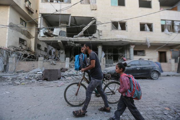October 3, 2026, Gaza City, Gaza Strip, Palestinian Territory: Palestinians inspect the destruction after Israeli aircraft targeted a residential apartment in the Al-Rimal neighborhood of western Gaza City early in the morning. According to local sources, five Palestinians were killed, including four women. Among those killed were a Christian mother and her daughter. Gaza City Palestinian Territory - ZUMAz119 20261003_zip_z119_025 Copyright: xSalahxHashemx
