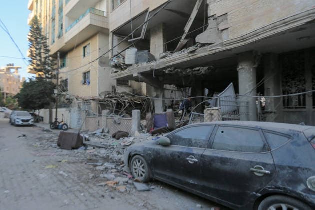 October 3, 2026, Gaza City, Gaza Strip, Palestinian Territory: Palestinians inspect the destruction after Israeli aircraft targeted a residential apartment in the Al-Rimal neighborhood of western Gaza City early in the morning. According to local sources, five Palestinians were killed, including four women. Among those killed were a Christian mother and her daughter. Gaza City Palestinian Territory - ZUMAz119 20261003_zip_z119_022 Copyright: xSalahxHashemx