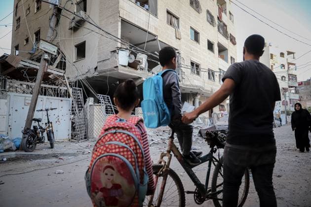 October 3, 2026, Gaza, Palestine, State of: GAZA Gaza, GAZA STRIP, OCTOBER 3, 2026: Palestinians and rescue workers search through the rubble following an Israeli airstrike on a residential building in the Rimal neighborhood of western Gaza City early Saturday. At least five Palestinians were killed and others wounded in the strike, according to Gaza health and civil defense officials. Rescue crews continued searching the damaged building for missing people following the attack. There was no immediate comment from the Israeli military. Gaza Palestine, State of - ZUMAq101 20261003_zna_q101_006 Copyright: xMohammedxMxSkaikx