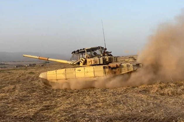 TAJIKISTAN - OCTOBER 3, 2026: Russian tank crews destroy a simulated enemy during the Tsentr Centre 2026 military exercise held at the Lyaur training ground. Video screen grab. Best quality available Tajikistan - ZUMAt113 20261003_zaa_t113_004 Copyright: xRussianxDefencexMinistryx