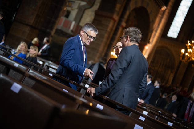 Ecumenical service at St. Petri Cathedral: Carsten Linnemann, Federal Minister of Health, in conversation with government spokesperson Stefan Kornelius and Mira Schlüter, Carsten Linnemann’s chief of staff. Official central celebrations for German Unity Day 2026 in Bremen, Bremen, Germany, downtown