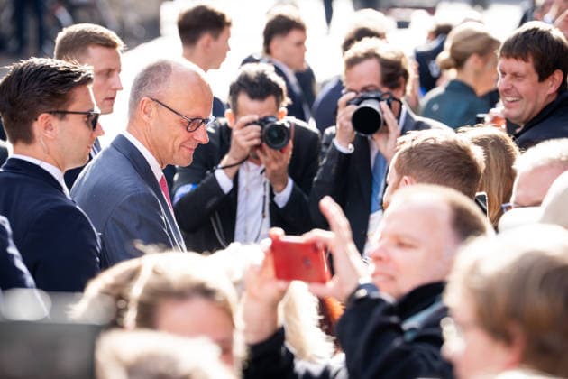 Celebrations for German Unity Day 2026 in Bremen: Federal Chancellor Friedrich Merz (CDU) greets and speaks with citizens as part of the festivities on October 3, 2026, following the ecumenical service at St. Petri Cathedral, Bremen, October 3, 2026, Bremen, Bremen, Germany