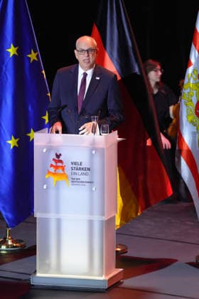 German Unity Day Ceremony in Bremen: Andreas Bovenschulte, President of the Bundesrat and Mayor of Bremen, delivering his speech at the German Unity Day ceremony at *Die Glocke*, Bremen, October 3, 2026, Bremen, Germany