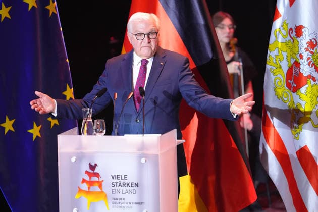 German Unity Day Ceremony in Bremen: Federal President Frank Walter Steinmeier spreads his arms wide with a serious expression during his speech at the German Unity Day ceremony at the Glocke, Bremen, October 3, 2026, Bremen, Germany