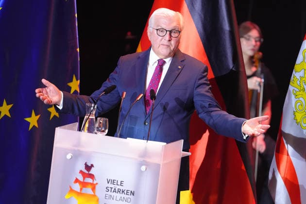 German Unity Day Ceremony in Bremen: Federal President Frank Walter Steinmeier spreads his arms wide with a serious expression during his speech at the German Unity Day ceremony at the Glocke, Bremen, October 3, 2026, Bremen, Germany